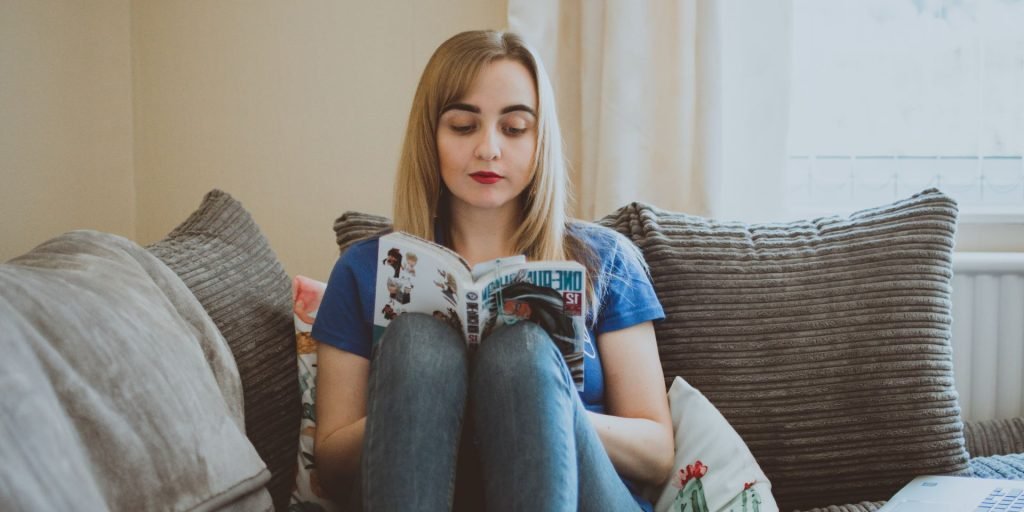 relaxed woman reading a book