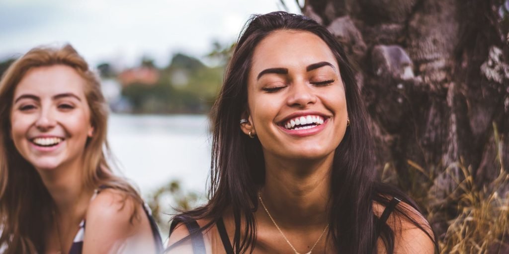 two girls smiling