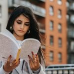 Woman Reads Anxiety Calming Scripture