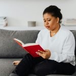 Woman Reads Anxiety Calming Scripture