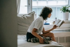 Woman Reads Anxiety Calming Scripture