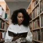 Woman Reads Anxiety Calming Scripture