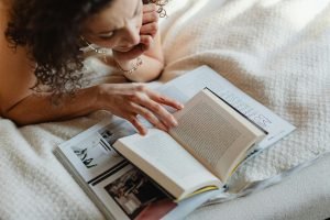 Woman Reads Anxiety Calming Scripture