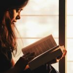 Woman Reads Anxiety Calming Scripture