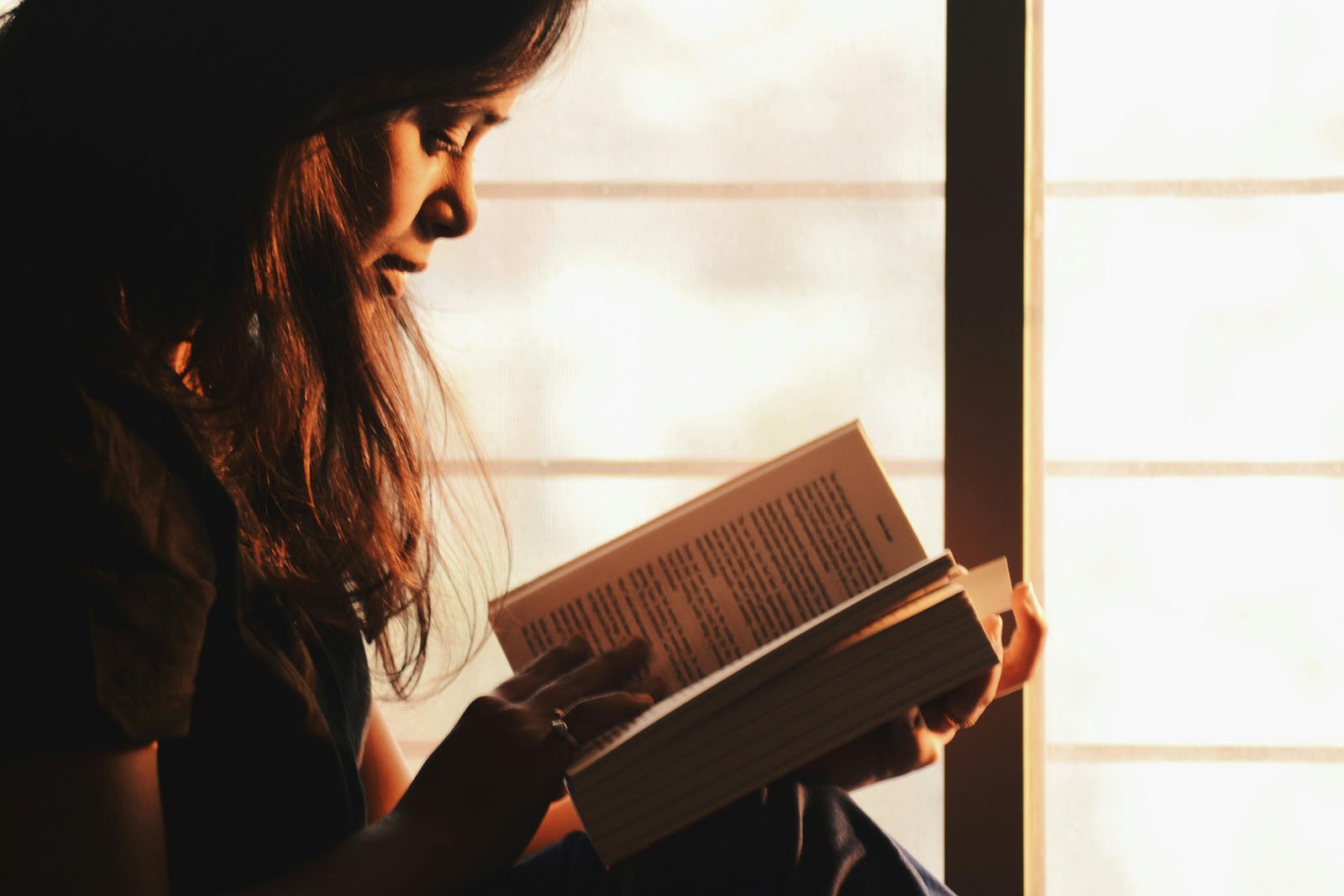 Woman Reads Anxiety Calming Scripture