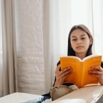 Woman Reads Anxiety Calming Scripture