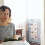 Woman Reads Anxiety Calming Scripture