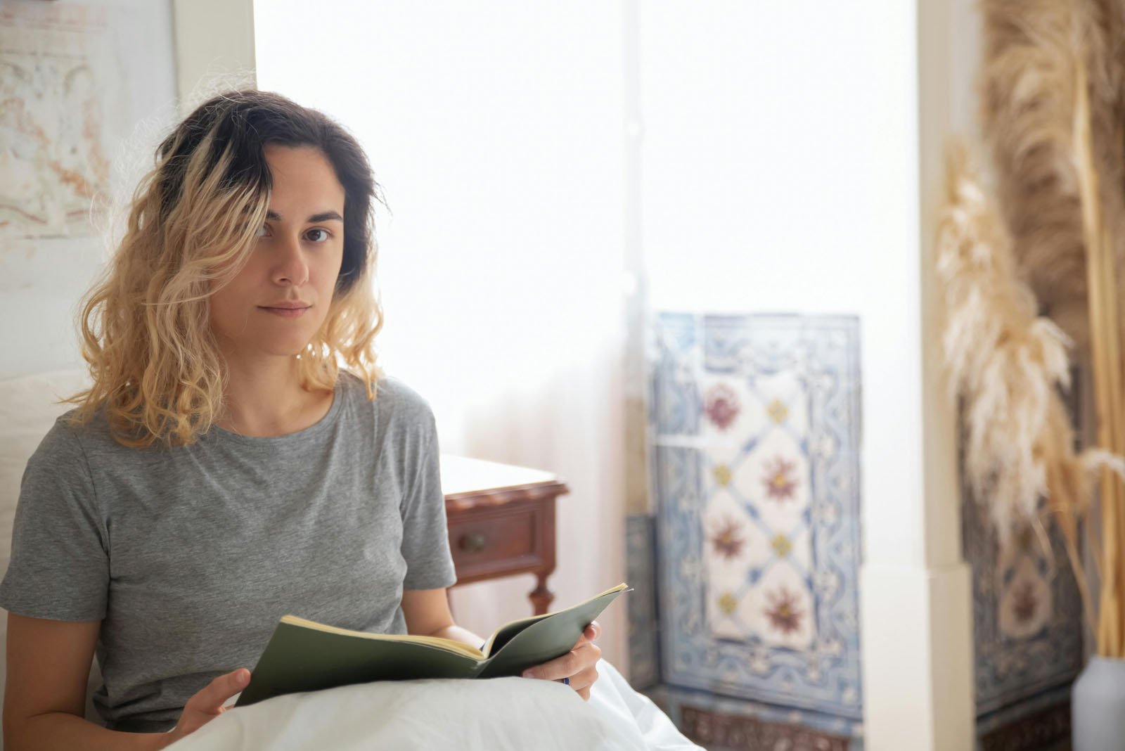 Woman Reads Anxiety Calming Scripture