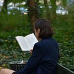 Woman Reads Anxiety Calming Scripture
