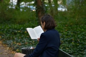 Woman Reads Anxiety Calming Scripture