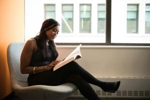 Woman Reads Anxiety Calming Scripture